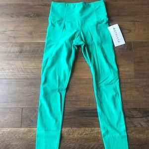 Athleta Salutation Stash Pocket Tight In Powervita